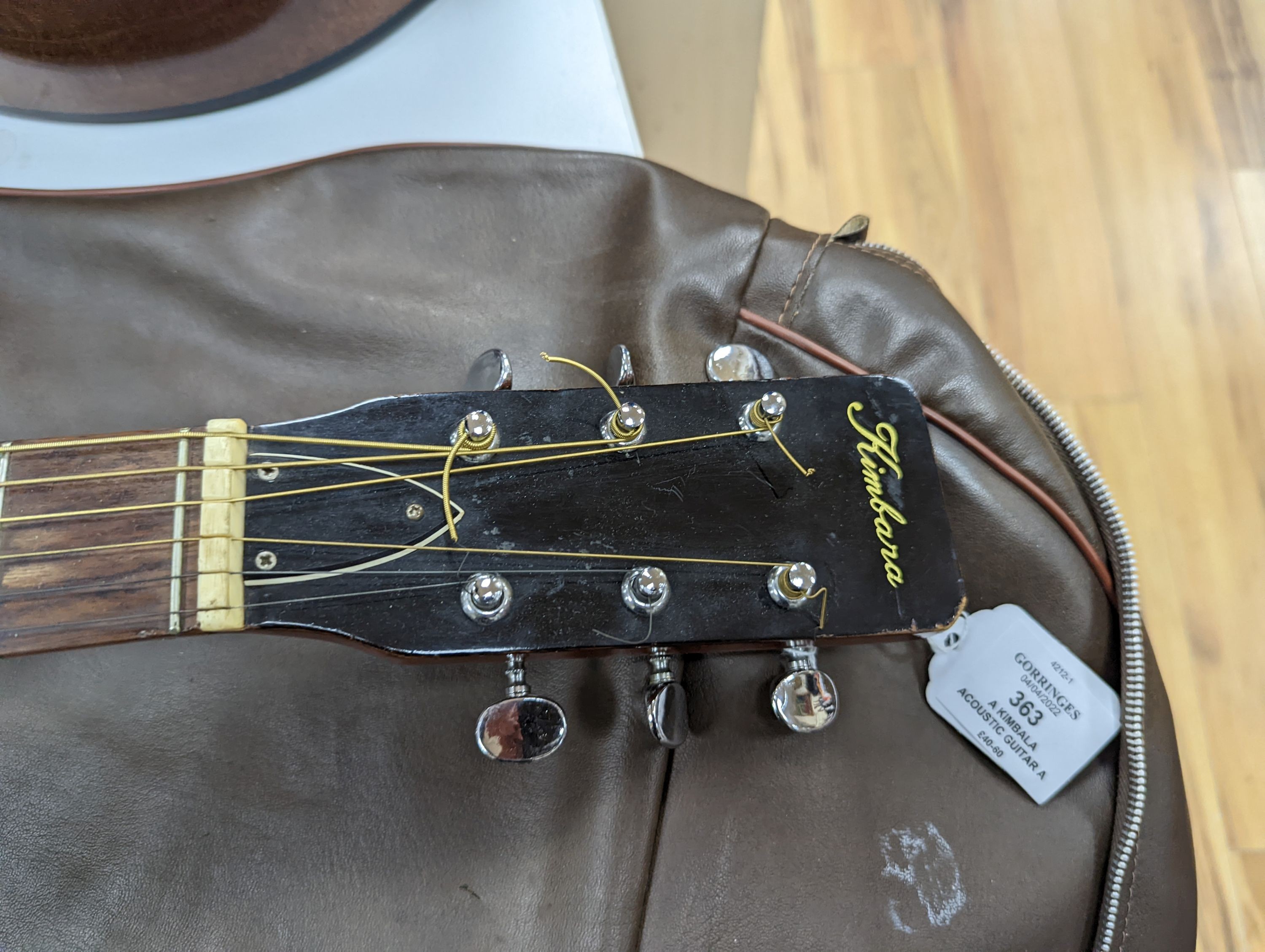 A Kimbala acoustic guitar.